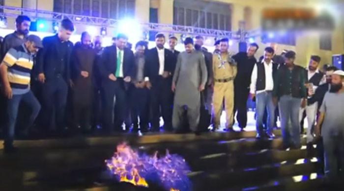 Celebrations at Sindh Governor's House over victory against India, Rafale aircraft model set on fire