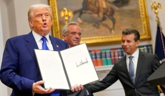 Trump signs