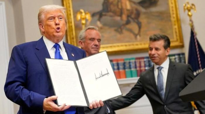 Trump signs