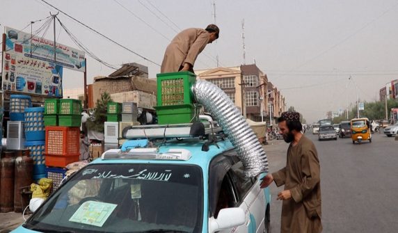 Afghan taxi drivers come up with a unique solution to escape the heat