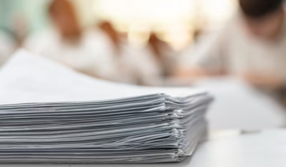 A mother and a private tutor in South Korea were caught red-handed stealing exam papers
