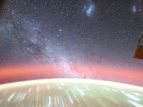 NASA astronaut shares a picture of Earth and 3 galaxies together
