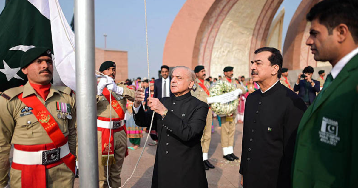 Prime Minister Shehbaz Sharif hoists the flag at the Pakistan Monument