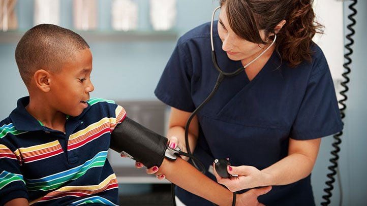 What disease can cause high blood pressure in children