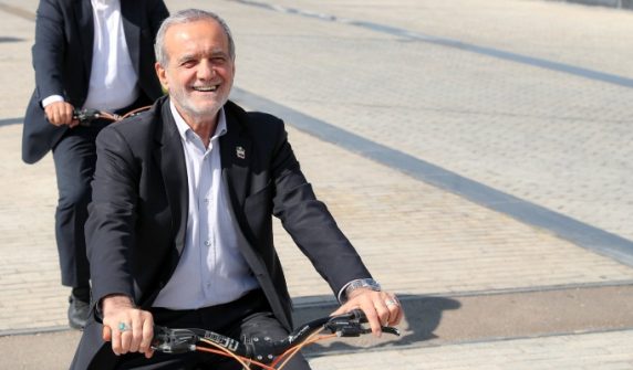 Iranian President riding bicycle in Isfahan