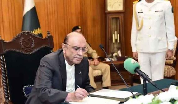 President Asif Ali Zardari signs the 27th Constitutional Amendment Bill