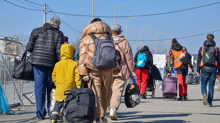 Britain to review asylum policy and make refugee status temporary