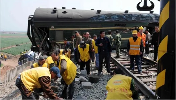Train crushes workers on track in China