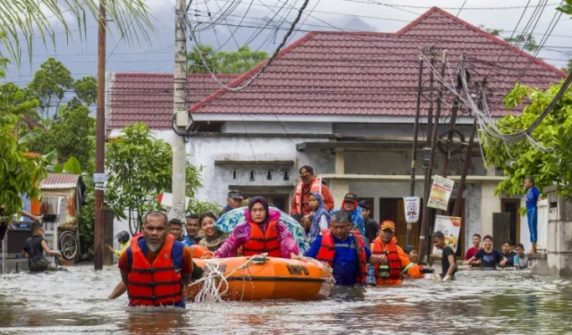 65 missing in floods and landslides after torrential rains