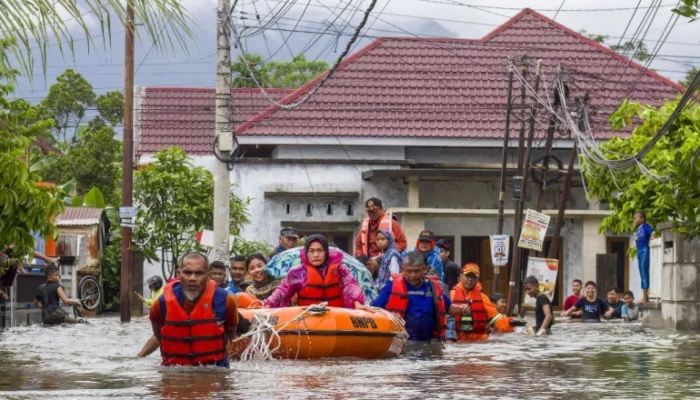 65 missing in floods and landslides after torrential rains