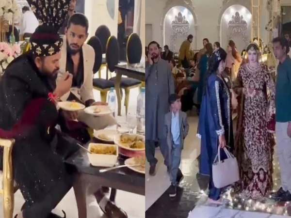 the groom is also busy eating when the bride enters.