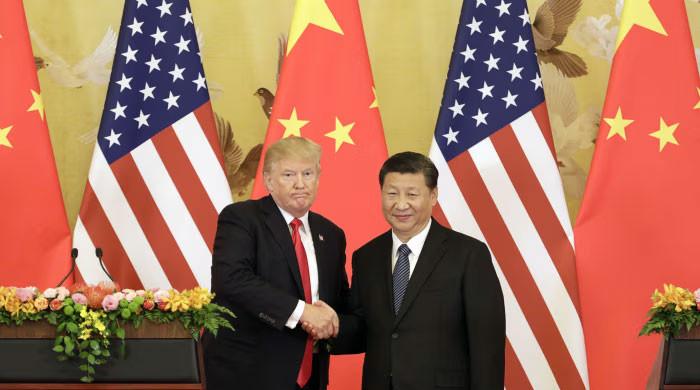 US President announces visit to China next year