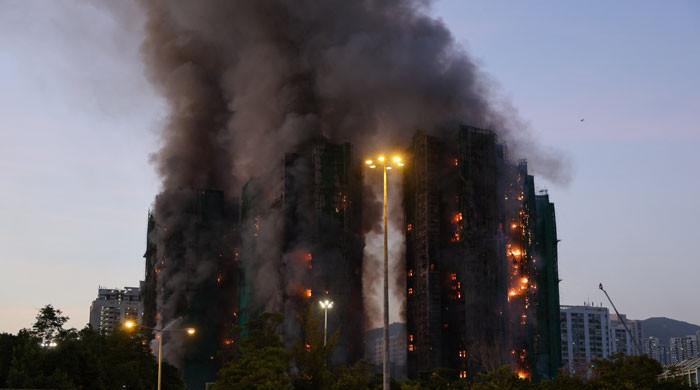 dozens missing in Hong Kong apartment complex fire
