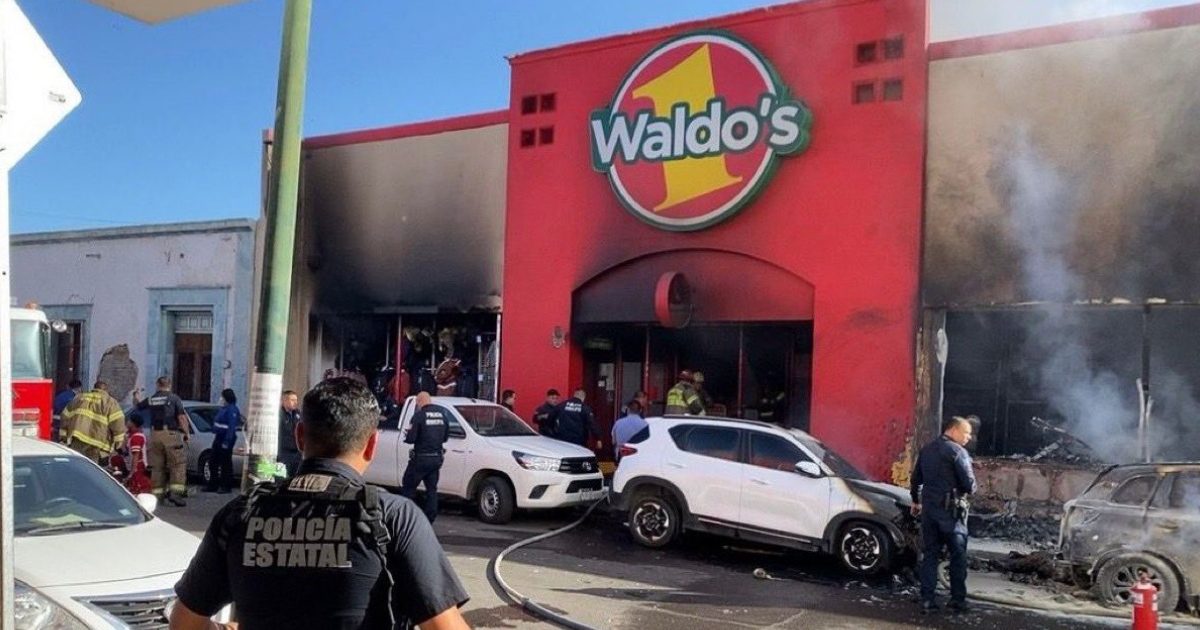 Massive fire breaks out after explosion in supermarket