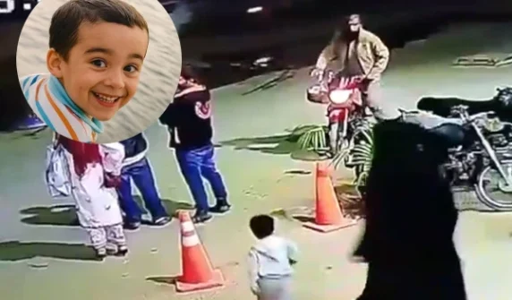 CCTV footage of a child falling into an open manhole