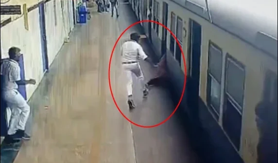 Railway official saves woman who fell from moving train