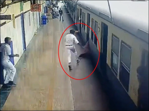 Railway official saves woman who fell from moving train