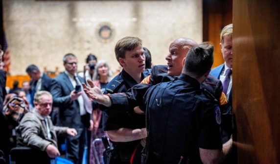 Former US soldier kicked out of hall for protesting US attack on Iran