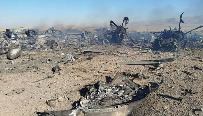 Iran loaded the wreckage of American planes destroyed during the war onto trucks and hoisted Iranian flags on them