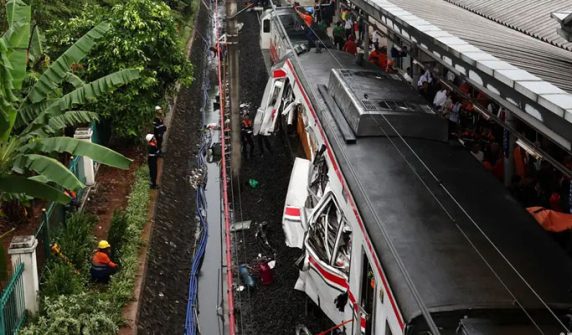 dozens injured in collision between two trains in Indonesia