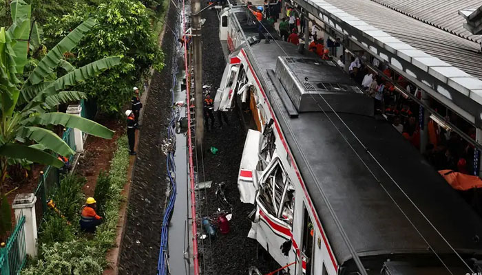 dozens injured in collision between two trains in Indonesia