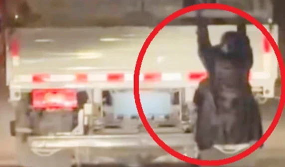 Wife hangs herself from truck to catch husband red-handed