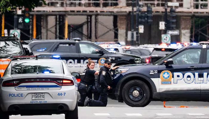 Two people, including a police officer, were killed in a shooting in the Canadian city of Montreal