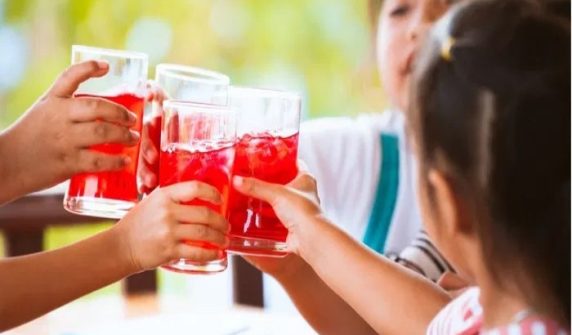 What problems can sugary drinks in childhood cause in middle age?