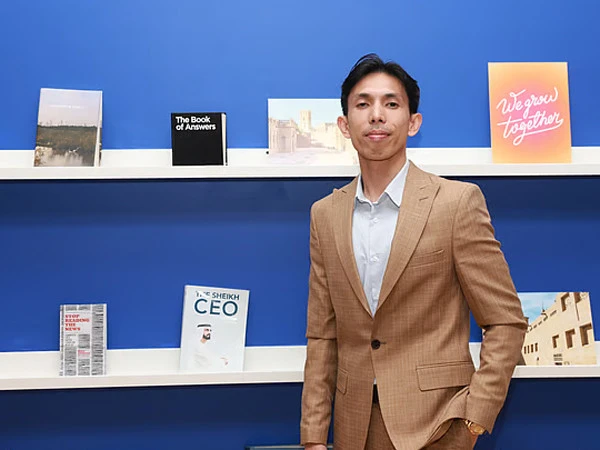 How did a waiter in the UAE become a businessman?
