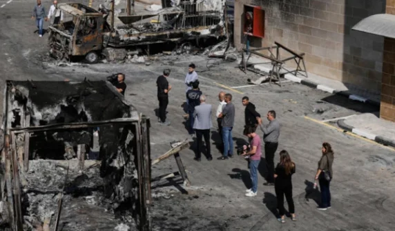 Israeli settlers set fire to Palestinian properties