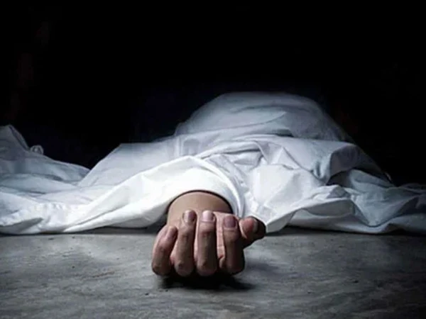 Bullet-riddled body of a watchman recovered from a house in Islamabad.