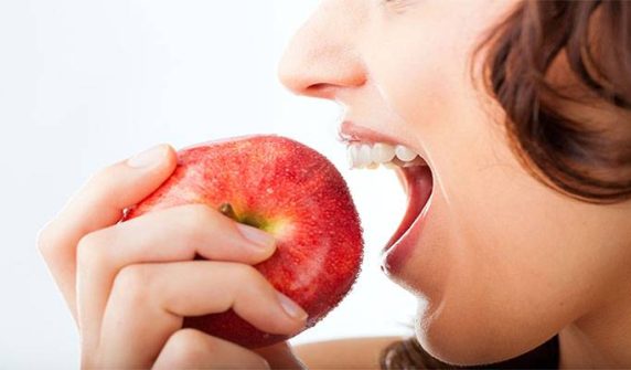 Why is the habit of eating an apple daily beneficial for health?