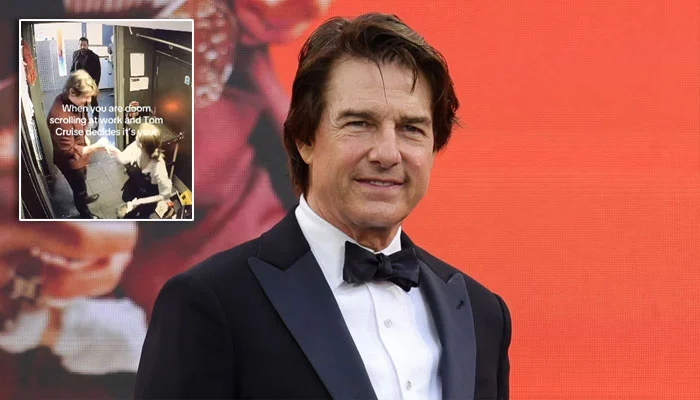Woman engrossed in her phone has a surprise encounter with Tom Cruise