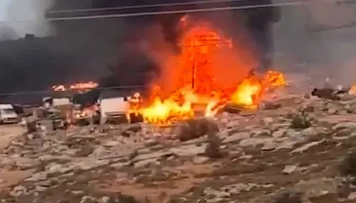 Israeli settlers raid Palestinian village