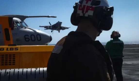 Three US aircraft carriers deployed to boost military strength near Iran.