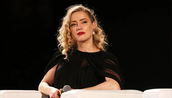 What kind of life is Amber Heard living after changing her name?