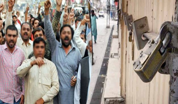 Traders of Tollington Market in Lahore attack district administration team