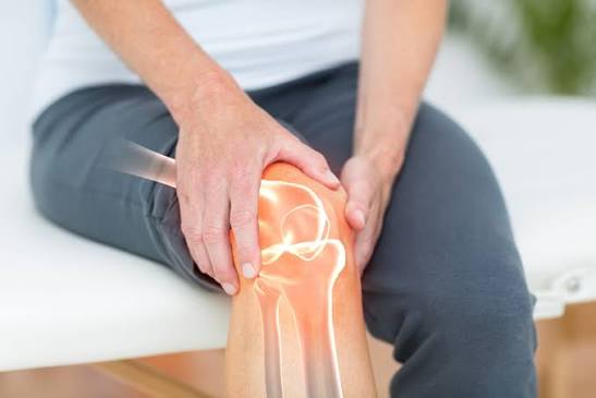 Should arthritis patients exercise or rest completely?